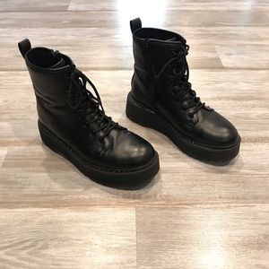 Black combat platform boots